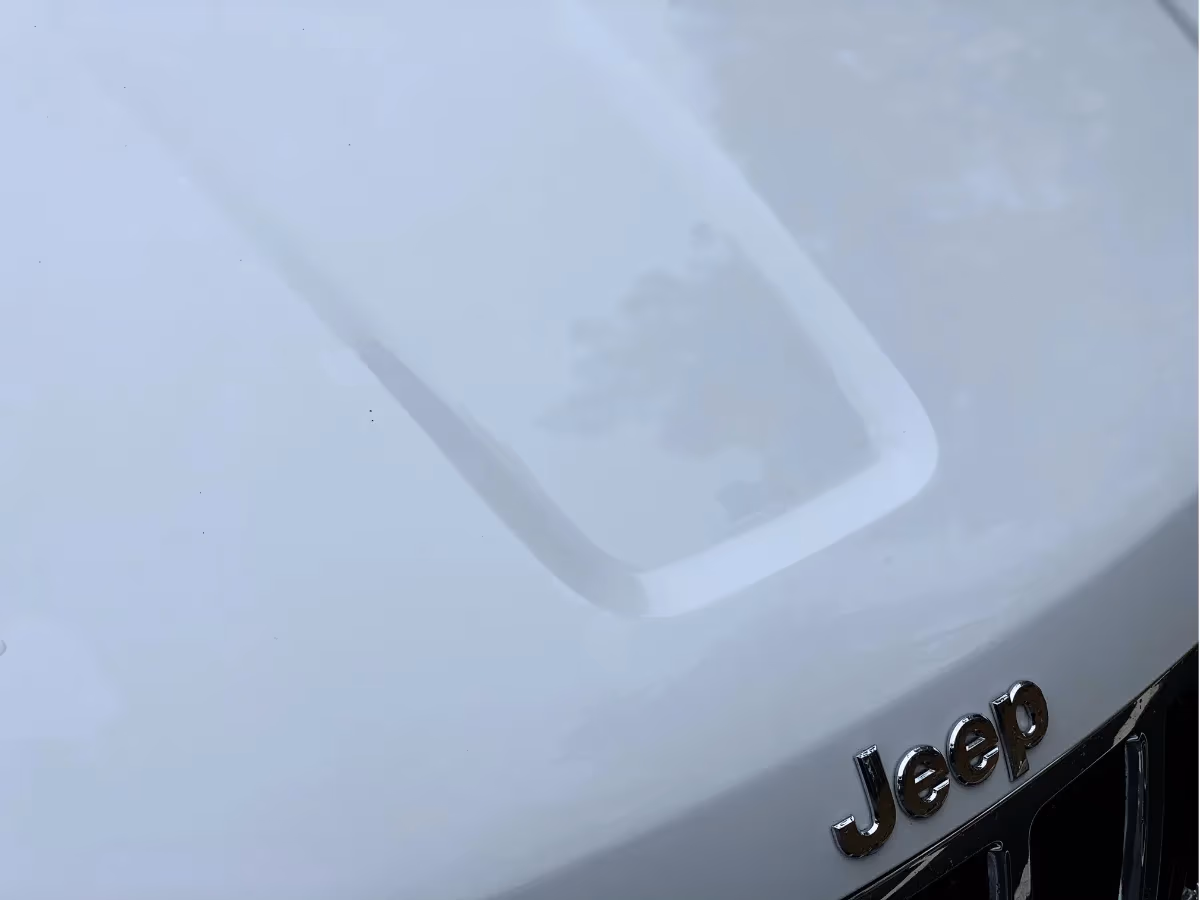 After: White Jeep exterior, before and after detailing