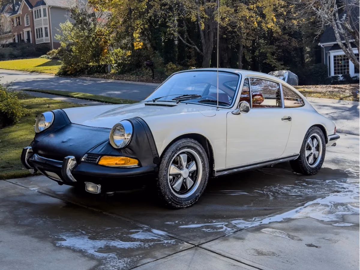 White Porsche with a finished, glossy exterior detail
