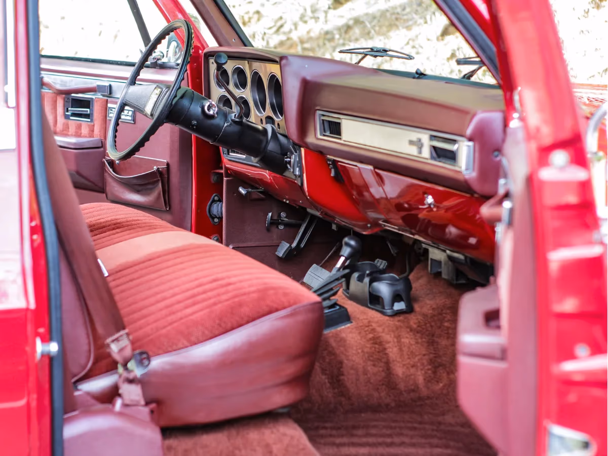 Red truck interior cleaned from carpet to dash