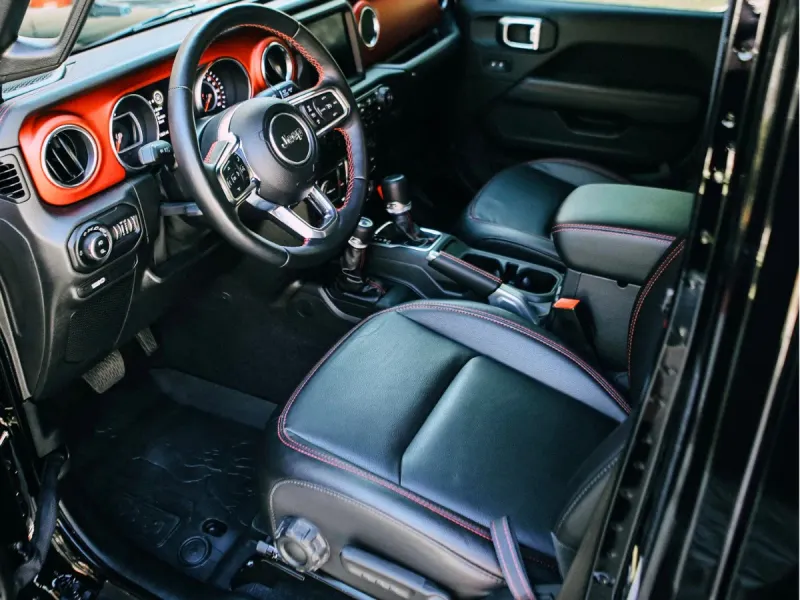 Conditioned black leather Jeep interior after detailing in Kennesaw