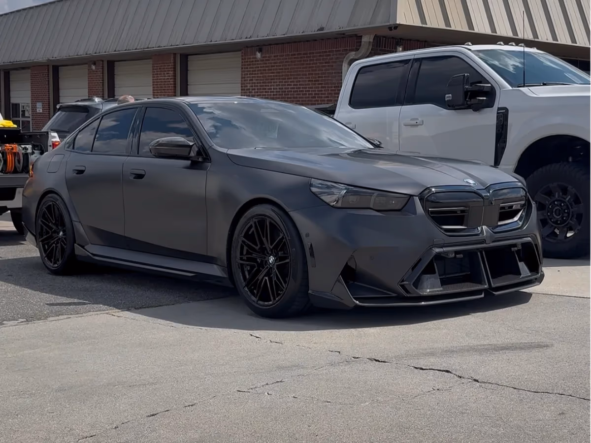 Black BMW protected with paint protection film